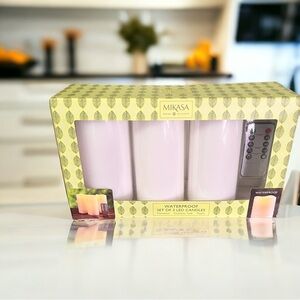 SET OF 3 LED CANDLES w/ remote. Sunproof and waterproof. NEW! Never used.